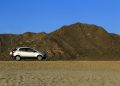 Suv car parked in Mountainous landscape in the desert of Ameria, Spain השוד שכמעט קרה